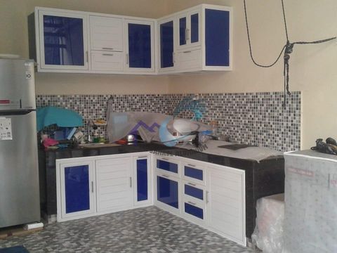 Kitchen set sudut L aluminium anti rayap warna putih biru buatan CV. Sahrul Aluminium